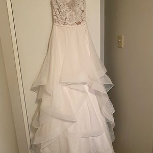 Beautiful wedding dress. **Never worn** size 6
